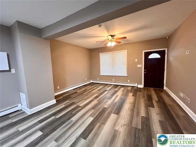 820 Ridge St, West Easton Borough, PA 18042 - entrance foyer featuring a baseboard heating unit, wood finished floors, and a ceiling fan