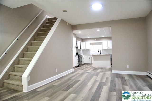 820 Ridge St, West Easton Borough, PA 18042 - unfurnished living room featuring recessed lighting, light wood-style flooring, and stairs