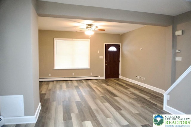 820 Ridge St, West Easton Borough, PA 18042 - entrance foyer featuring a baseboard radiator, wood finished floors, and a ceiling fan