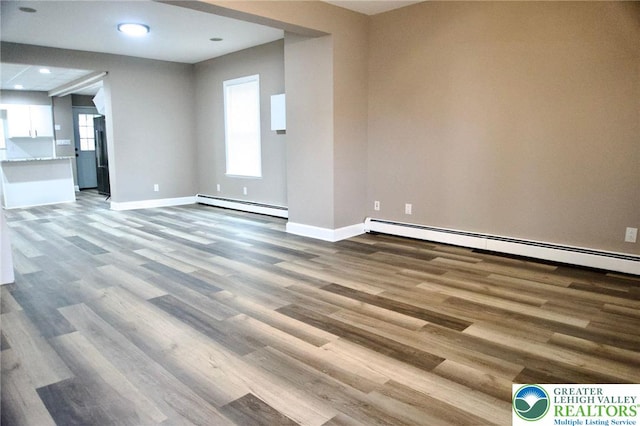 820 Ridge St, West Easton Borough, PA 18042 - spare room with baseboard heating, wood finished floors, and recessed lighting