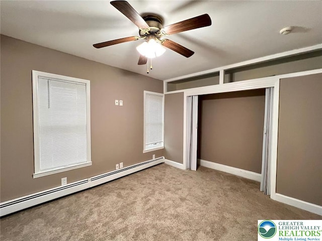 820 Ridge St, West Easton Borough, PA 18042 - unfurnished bedroom with baseboard heating, carpet, a closet, and ceiling fan