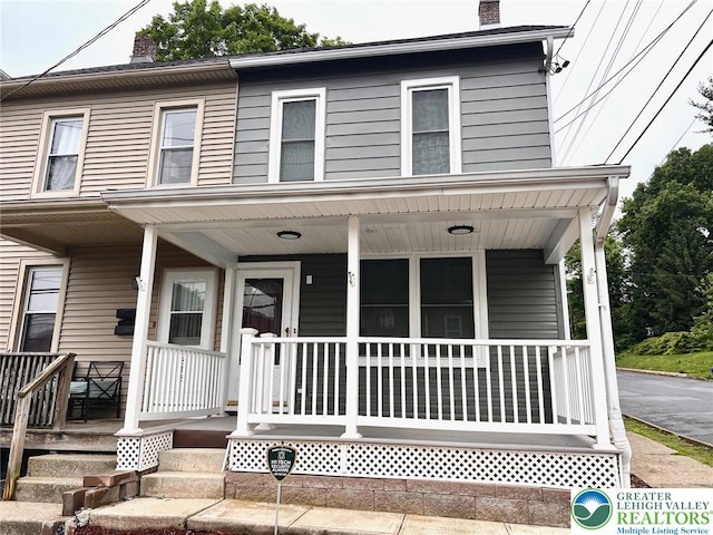 820 Ridge St, West Easton Borough, PA 18042 - view of front of home with a chimney and covered porch