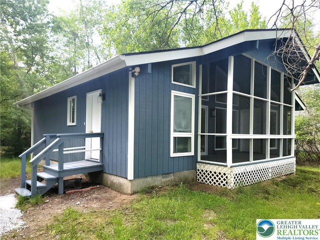 6522 Runnymead, Coolbaugh Twp, PA 18466 - view of property exterior featuring crawl space and a sunroom