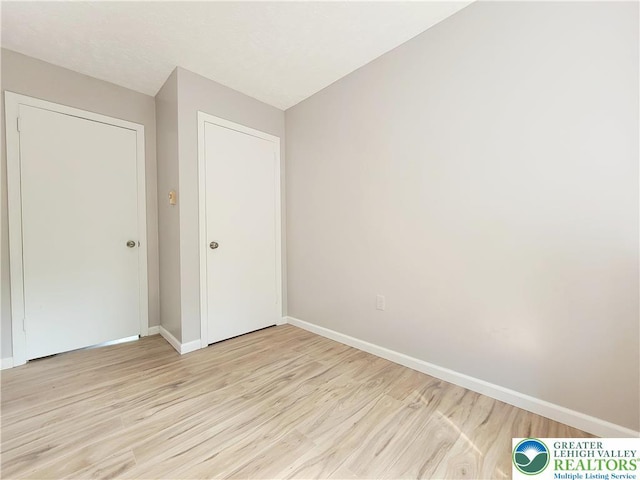 6522 Runnymead, Coolbaugh Twp, PA 18466 - unfurnished bedroom with light wood-style floors and baseboards