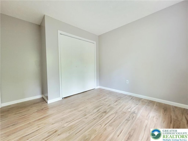 6522 Runnymead, Coolbaugh Twp, PA 18466 - unfurnished bedroom featuring light wood-style flooring and a closet