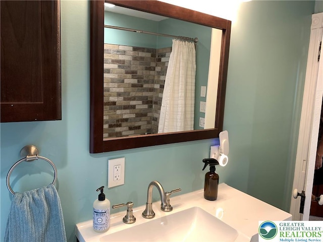 665 Walnut St, Emmaus Borough, PA 18049 - bathroom with a sink and a shower with curtain