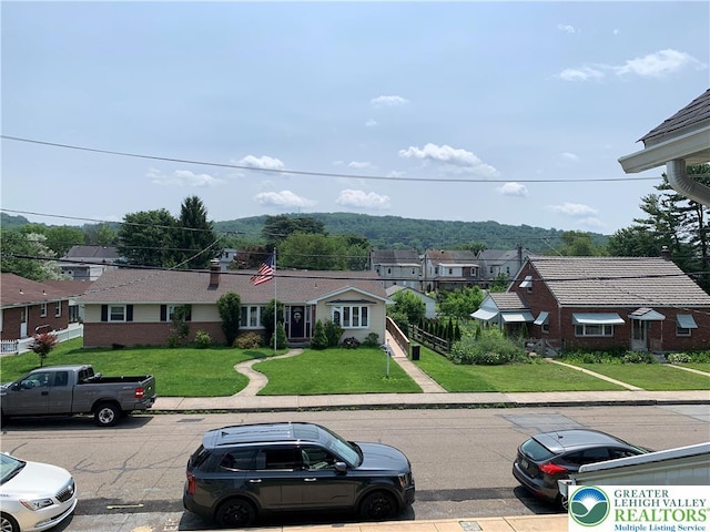 665 Walnut St, Emmaus Borough, PA 18049 - view of front of property with a residential view and a front yard