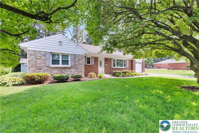 3032 W Woodlawn St, South Whitehall Twp, PA 18104 - ranch-style home with a front yard and stone siding