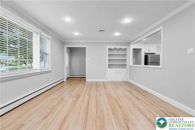 3032 W Woodlawn St, South Whitehall Twp, PA 18104 - unfurnished living room with a baseboard heating unit, crown molding, light wood finished floors, and recessed lighting
