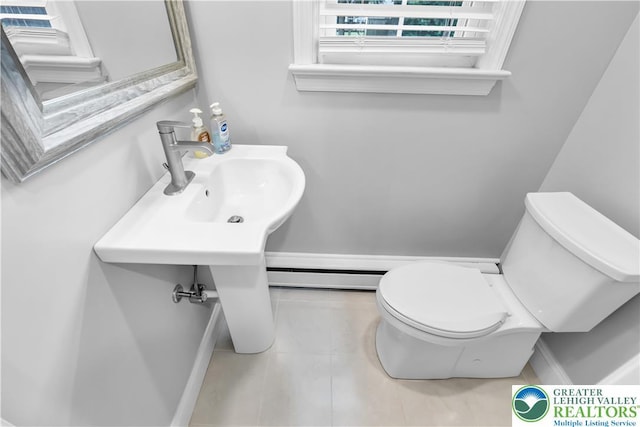 3032 W Woodlawn St, South Whitehall Twp, PA 18104 - bathroom featuring tile patterned flooring and a baseboard heating unit