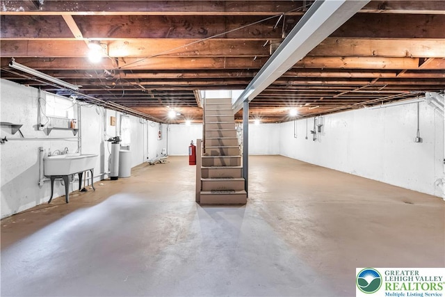 3032 W Woodlawn St, South Whitehall Twp, PA 18104 - unfinished below grade area featuring a sink and a water softener system