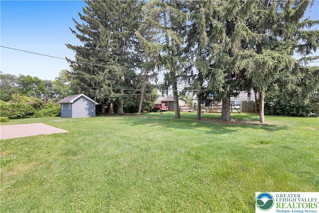 3032 W Woodlawn St, South Whitehall Twp, PA 18104 - view of grassy yard with a shed