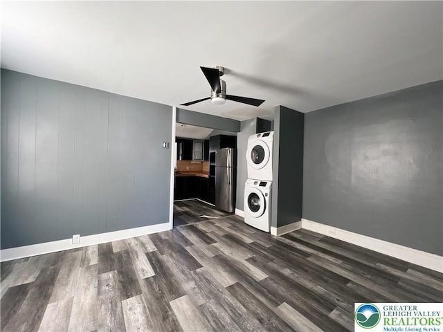 2236 2nd St, Easton, PA 18042 - unfurnished living room with stacked washer / dryer, ceiling fan, and dark wood-type flooring