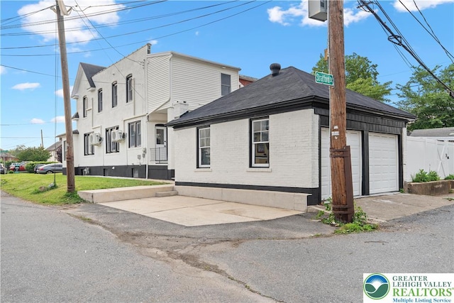 616 Highland Ave, Bethlehem City, PA 18018 - view of front of property with brick siding and a shingled roof