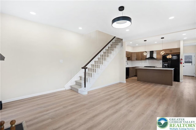 616 Highland Ave, Bethlehem City, PA 18018 - unfurnished living room with stairs, light wood-type flooring, and recessed lighting