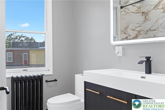 616 Highland Ave, Bethlehem City, PA 18018 - bathroom featuring radiator and vanity