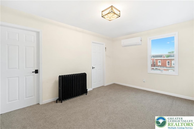 616 Highland Ave, Bethlehem City, PA 18018 - unfurnished room featuring radiator heating unit, a wall unit AC, and carpet
