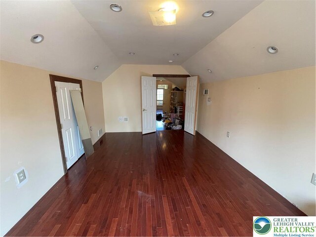 459 Mount Pleasant Rd, Washington Twp, PA 18013 - unfurnished living room featuring hardwood / wood-style flooring and lofted ceiling
