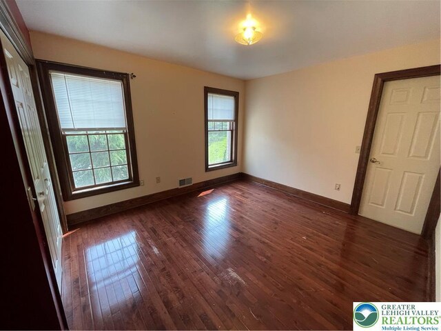 459 Mount Pleasant Rd, Washington Twp, PA 18013 - empty room with dark wood-style floors and baseboards