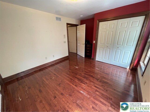 459 Mount Pleasant Rd, Washington Twp, PA 18013 - unfurnished bedroom featuring dark wood-type flooring and a closet