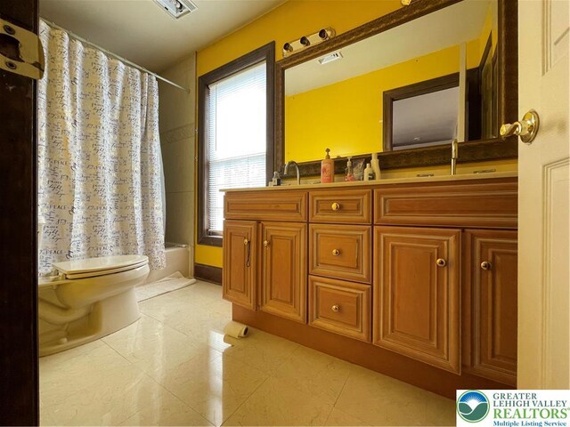 459 Mount Pleasant Rd, Washington Twp, PA 18013 - bathroom with double vanity, shower / bathtub combination with curtain, and tile patterned floors