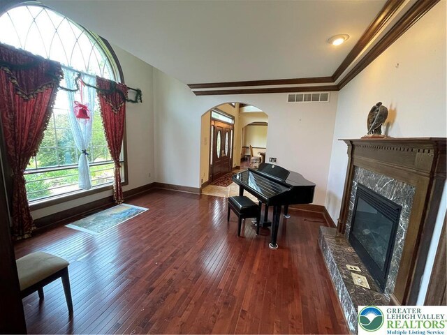 459 Mount Pleasant Rd, Washington Twp, PA 18013 - sitting room with arched walkways, hardwood / wood-style flooring, a fireplace, and ornamental molding