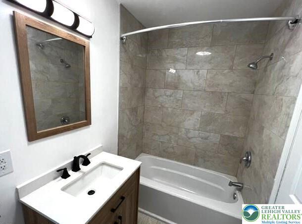 8237 Natures Dr, Coolbaugh Twp, PA 18466 - bathroom with vanity and shower / washtub combination