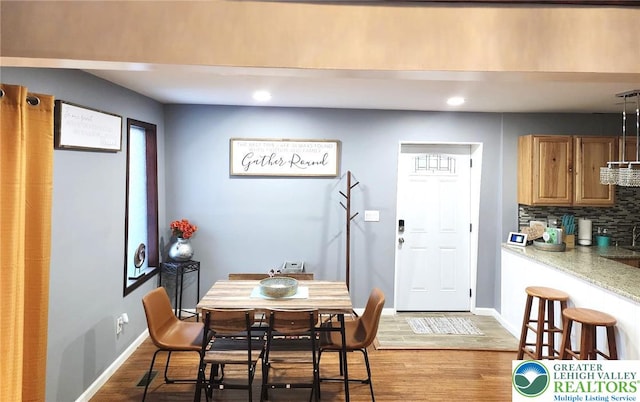 8237 Natures Dr, Coolbaugh Twp, PA 18466 - dining space featuring light wood-style floors and recessed lighting