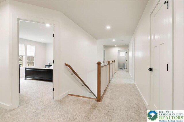 1615 Watson Loop, Upper Macungie Twp, PA 18051 - hall featuring an upstairs landing, light colored carpet, and recessed lighting