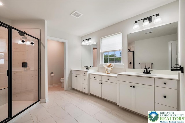 1615 Watson Loop, Upper Macungie Twp, PA 18051 - bathroom featuring marble look tile flooring, a stall shower, and vanity