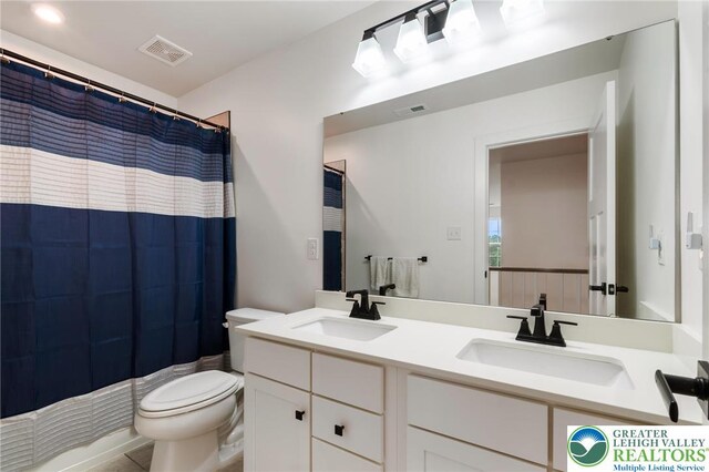 1615 Watson Loop, Upper Macungie Twp, PA 18051 - bathroom featuring double vanity and a shower with curtain