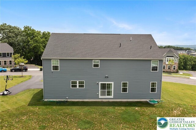 1615 Watson Loop, Upper Macungie Twp, PA 18051 - rear view of house with a yard