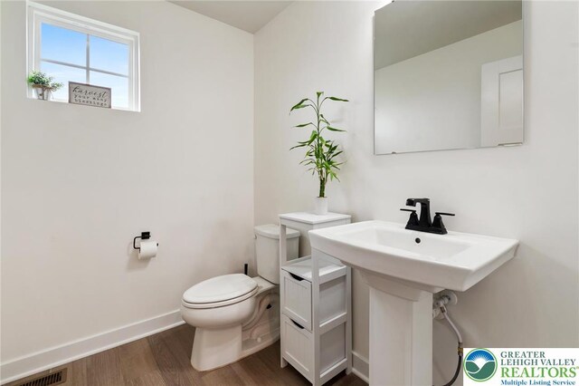 1615 Watson Loop, Upper Macungie Twp, PA 18051 - bathroom with toilet and wood finished floors