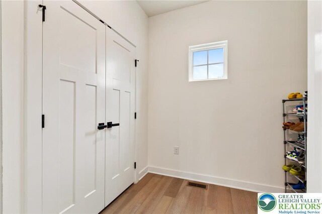 1615 Watson Loop, Upper Macungie Twp, PA 18051 - unfurnished bedroom featuring light wood-style floors and a closet