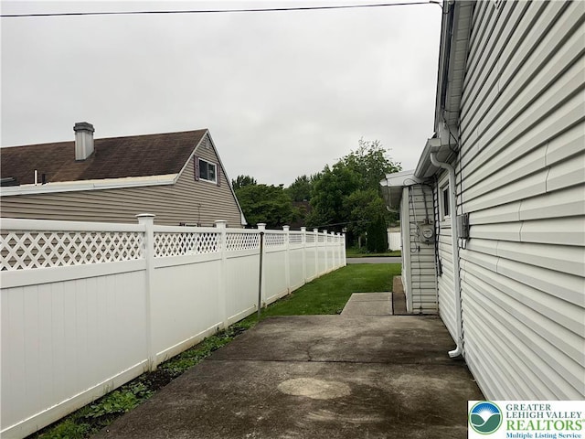 2115 Fireside Dr, Bethlehem City, PA 18018 - view of side of property with a patio area