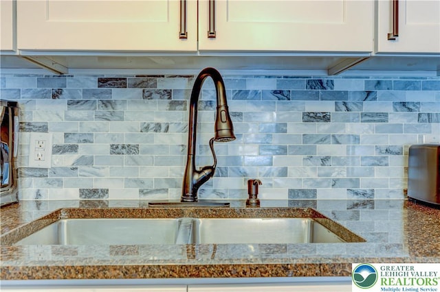 143 Cathleen Dr, Price Twp, PA 18302 - kitchen view of a sink and white cabinetry