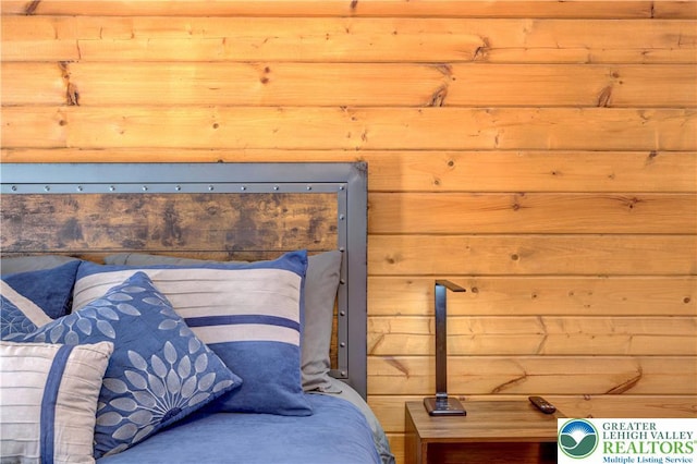 143 Cathleen Dr, Price Twp, PA 18302 - bedroom featuring wooden walls