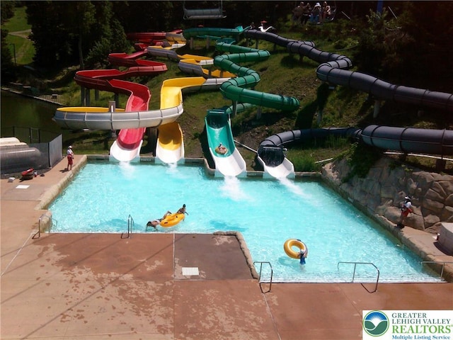 143 Cathleen Dr, Price Twp, PA 18302 - outdoor pool with a water slide