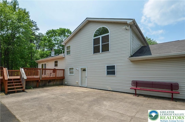 1214 Shadblow Rd, Tobyhanna Twp, PA 18346 - back of house with a deck, a patio, and roof with shingles