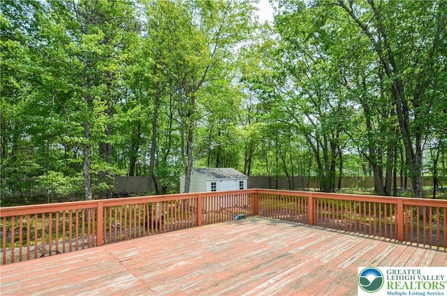 1214 Shadblow Rd, Tobyhanna Twp, PA 18346 - wooden terrace featuring an outbuilding and a fenced backyard