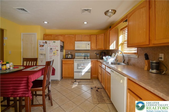 1214 Shadblow Rd, Tobyhanna Twp, PA 18346 - kitchen with white appliances, decorative backsplash, light tile patterned flooring, light countertops, and recessed lighting