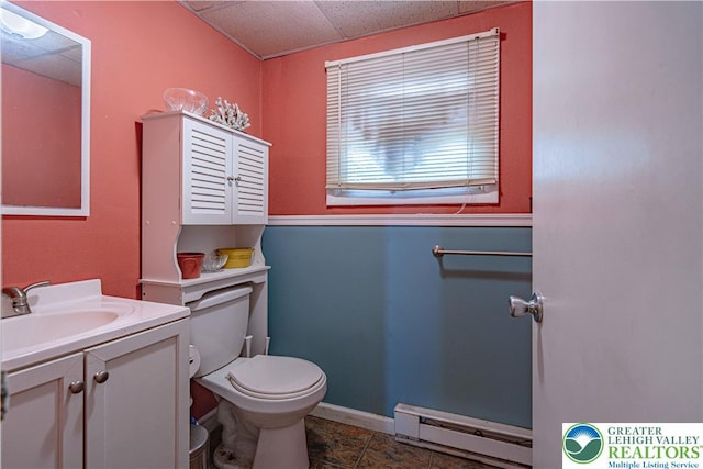1421 7th St, Bethlehem Twp, PA 18020 - half bathroom featuring a baseboard heating unit and vanity