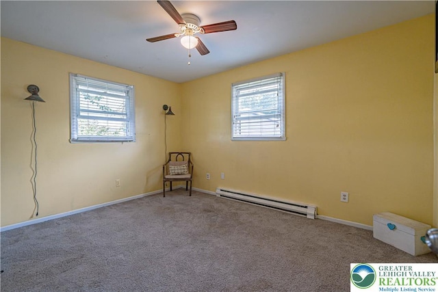 1421 7th St, Bethlehem Twp, PA 18020 - unfurnished room with a baseboard radiator, plenty of natural light, a ceiling fan, and carpet floors