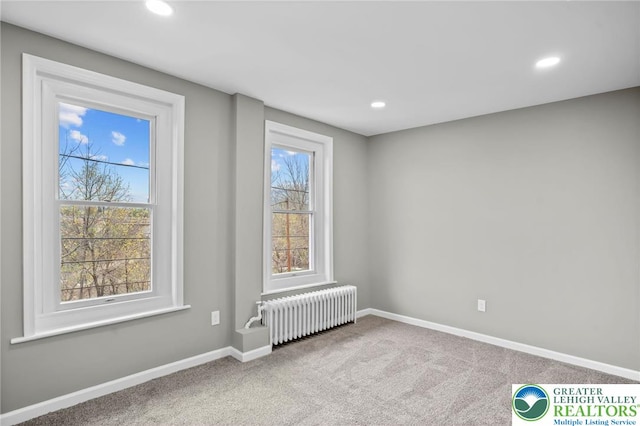1478 E 5th St, Bethlehem City, PA 18015 - carpeted empty room with radiator heating unit, recessed lighting, and healthy amount of natural light
