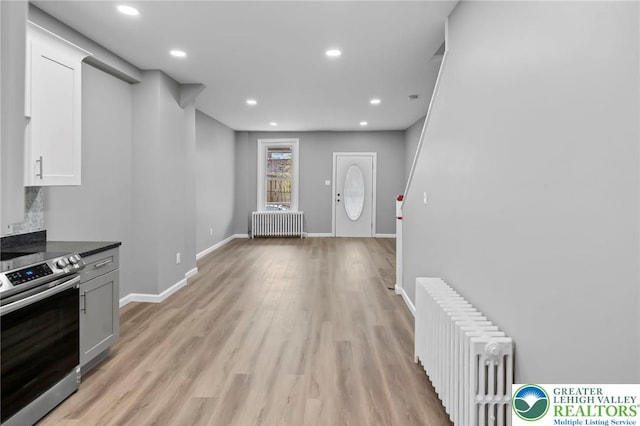 1478 E 5th St, Bethlehem City, PA 18015 - foyer entrance featuring radiator, light wood finished floors, and recessed lighting