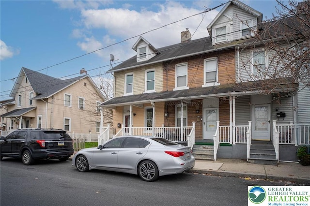 1478 E 5th St, Bethlehem City, PA 18015 - view of property with covered porch and a chimney