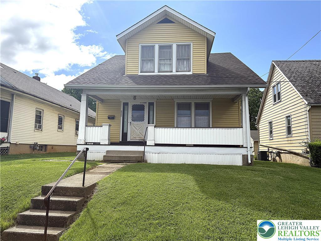 2960 William Penn Hwy, Easton, PA 18045 - view of front facade featuring a front lawn, covered porch, and roof with shingles