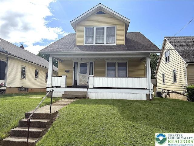 2960 William Penn Hwy, Easton, PA 18045 - view of front facade featuring a front lawn, covered porch, and roof with shingles