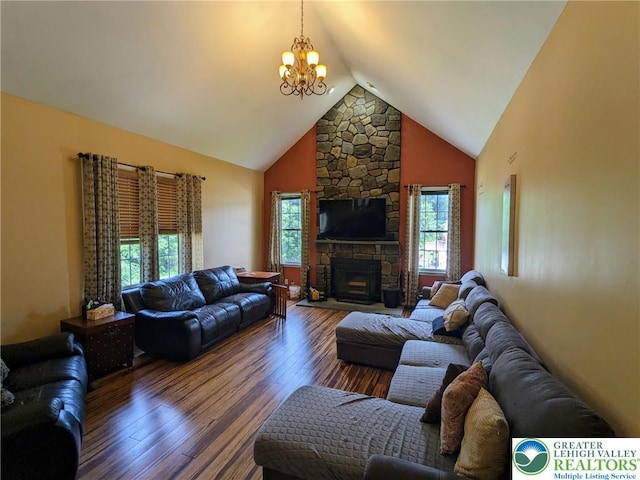 131 Winding Way, Washington Twp, PA 18013 - living area with wood finished floors, a chandelier, a stone fireplace, and high vaulted ceiling