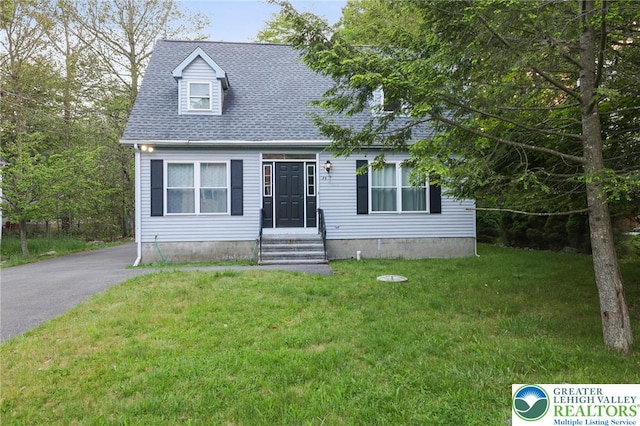 9436 Juniper Dr, Tobyhanna Twp, PA 18466 - cape cod home with a front yard and roof with shingles
